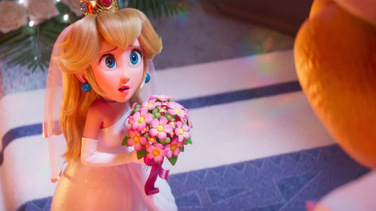 A very vulnerable-looking Peach in her wedding dress, looking up at Bowser with horror in her eyes, having just been told prisoners will be ritually sacrificed in her “honor.”