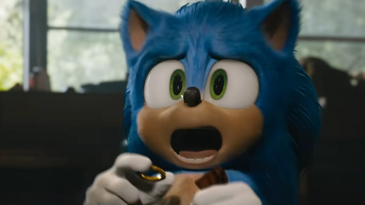 Sonic from the first Sonic the Hedgehog movie, holding a miniature warp ring and yelling in fear as he has just been discovered by a human. He previously looked very different and worse, but was redesigned so that in this version he simply looks bad.