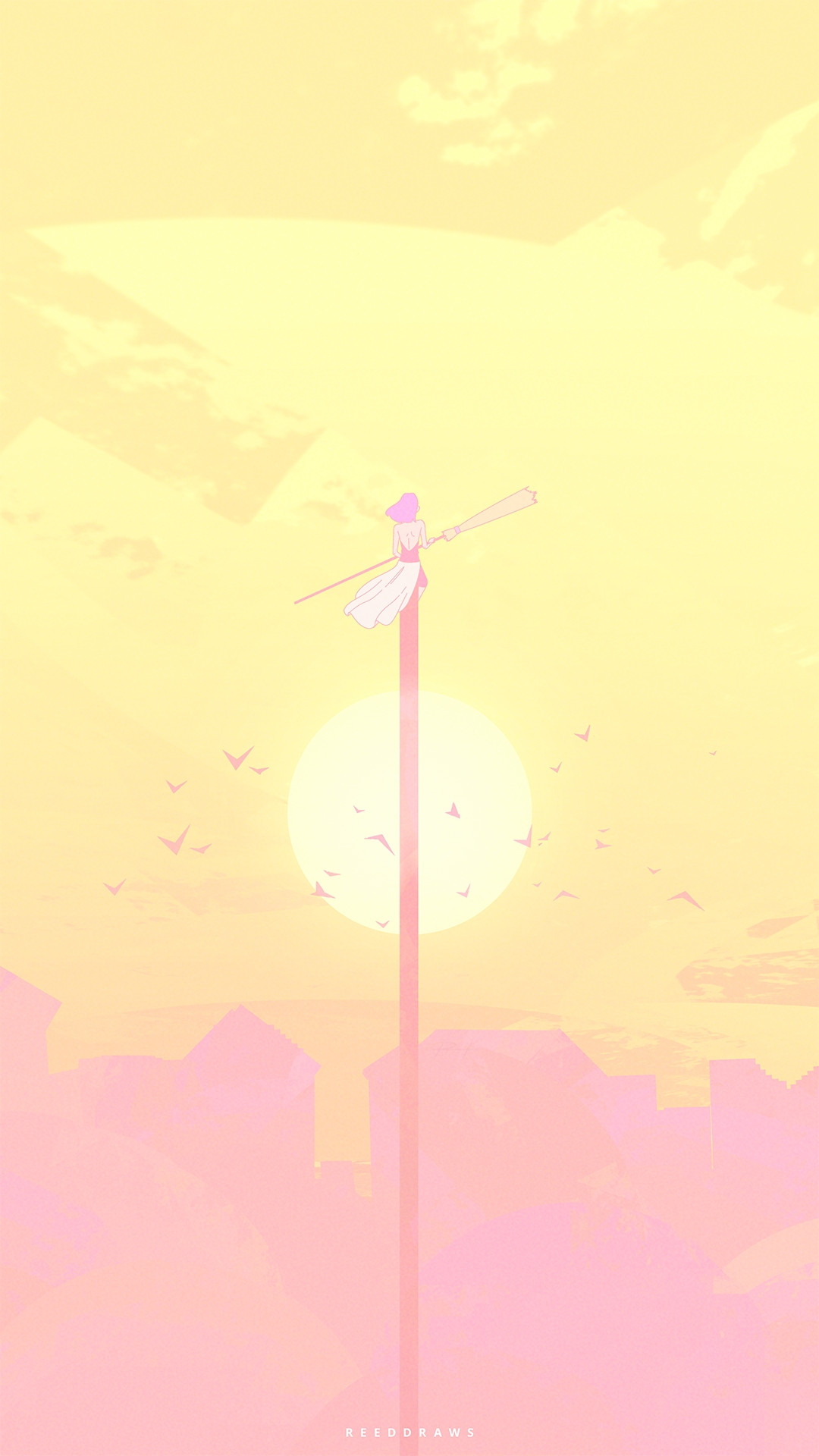 A witch sitting on a pole at sunset.