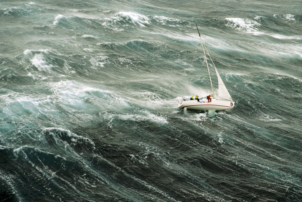 a sailboat in choppy water