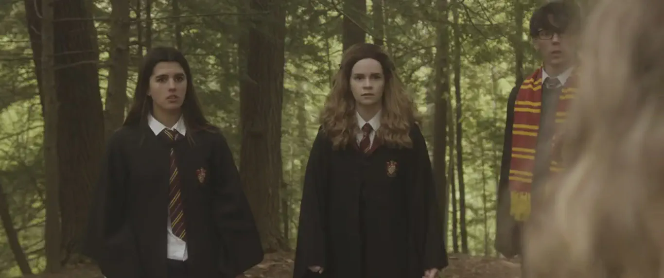 Hermione Granger (Kari Lewis) with Gryffindor students