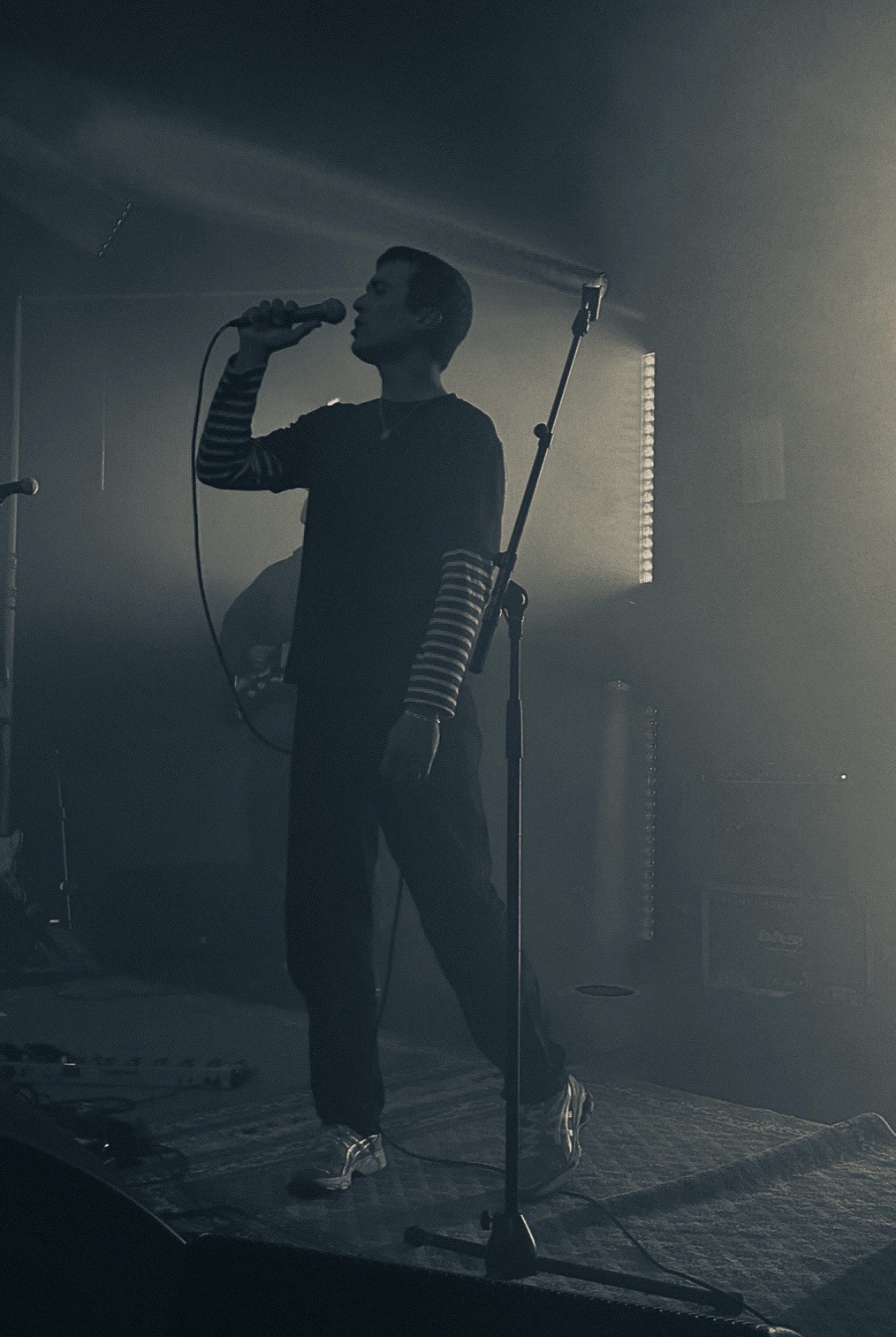 a monochrome photograph of hannes from lust for youth @ vivid sydney, 2023. photograph taken by me