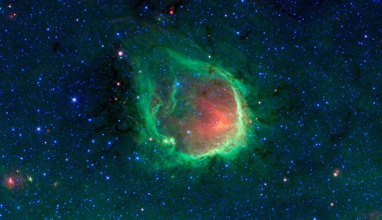 NASA's Spitzer Space Telescope displaying the infrared 'glow' of the gas and dust ring surrounding Nebula RCW 120 in Scorpius. © NASA