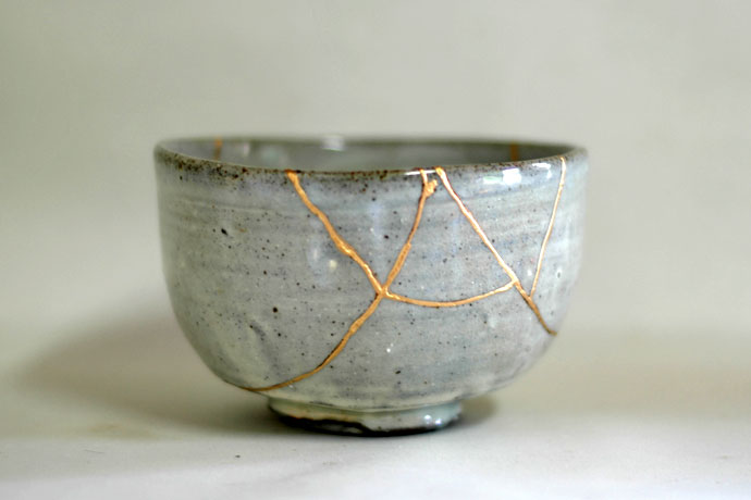 A bowl repaired with gold kintsugi
