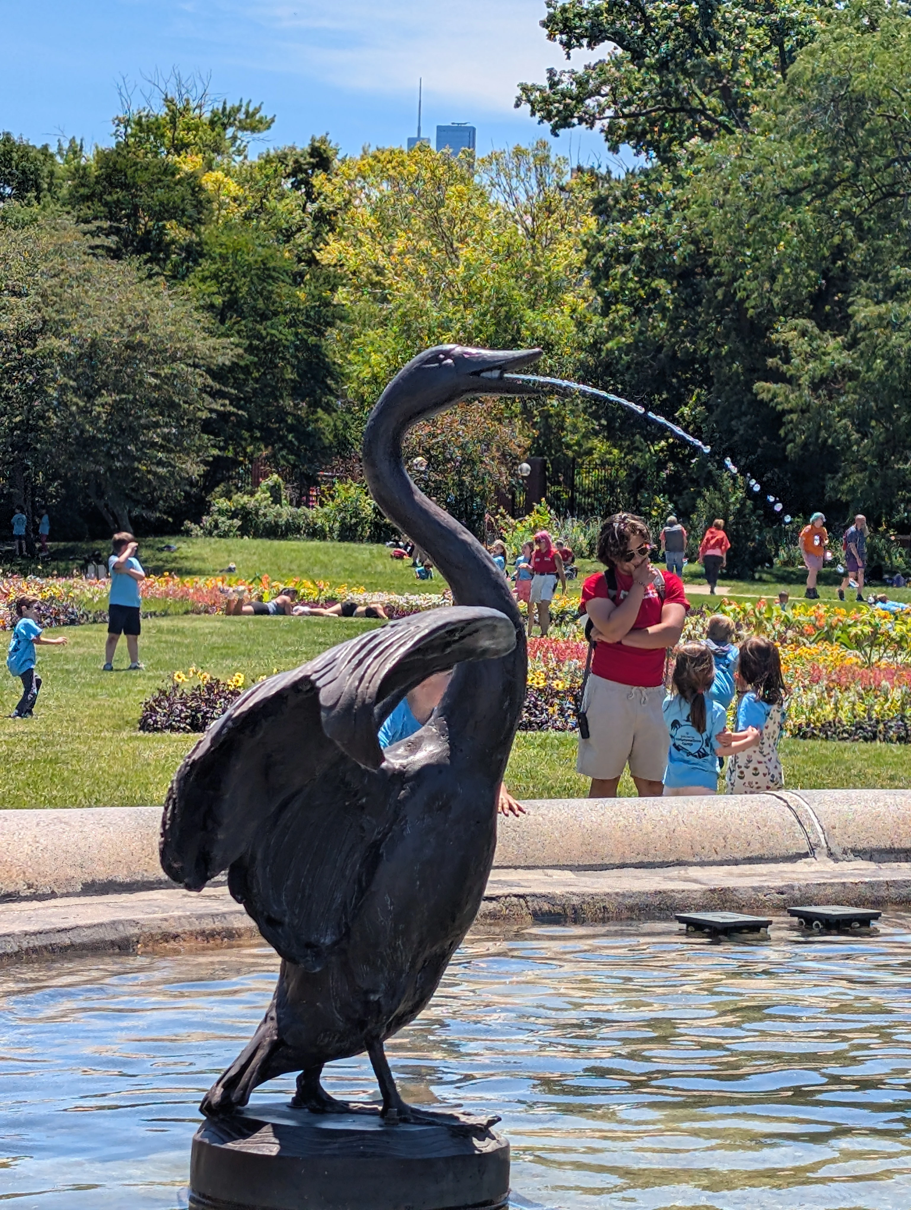 A statue, part of the fountain, of a trumpeter swan. It is spitting water, or barfing. We weren't sure.