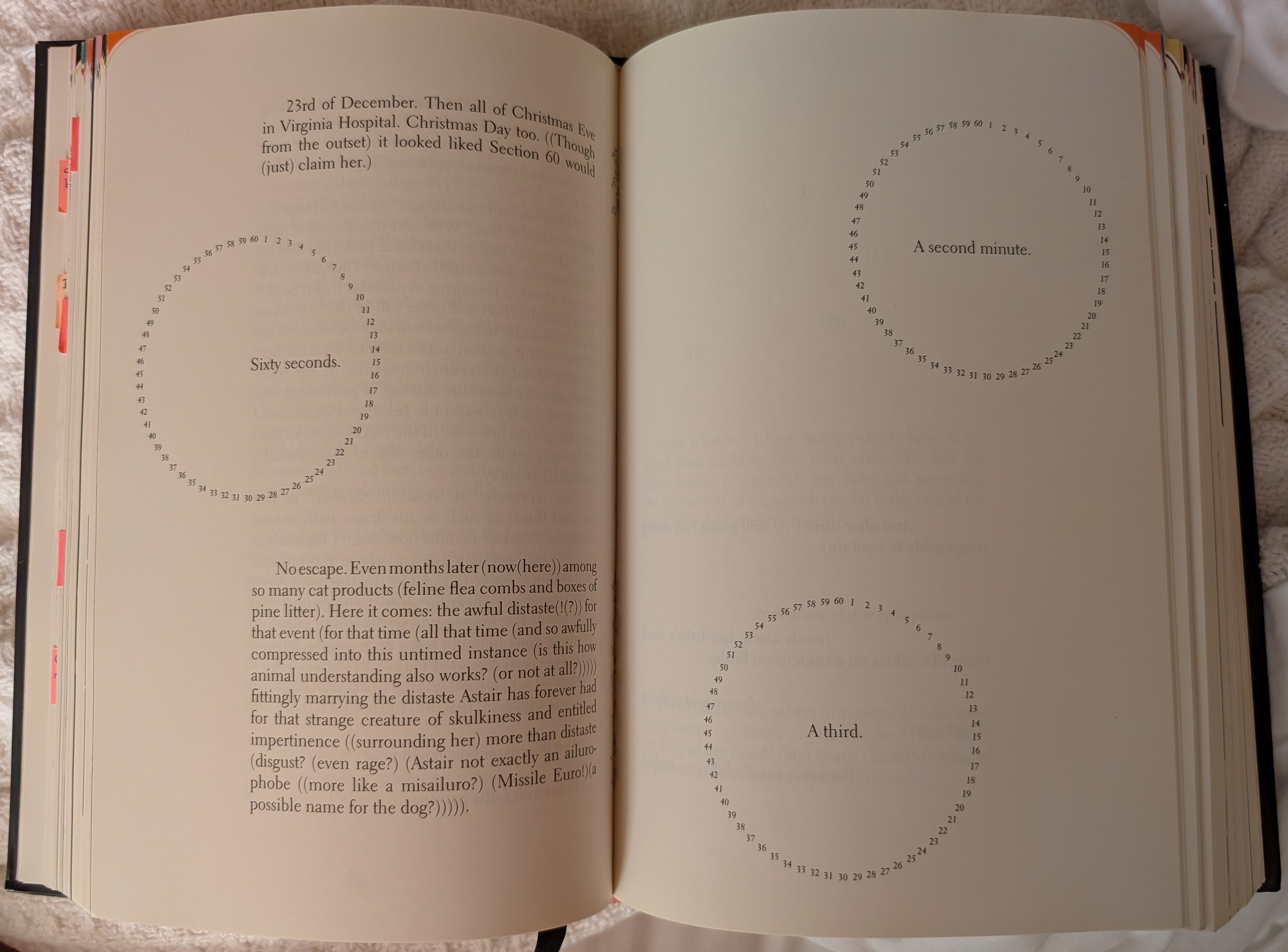 A pair of pages with more breathing room, and circles of numbers meant to visualize the sixty seconds of a minute