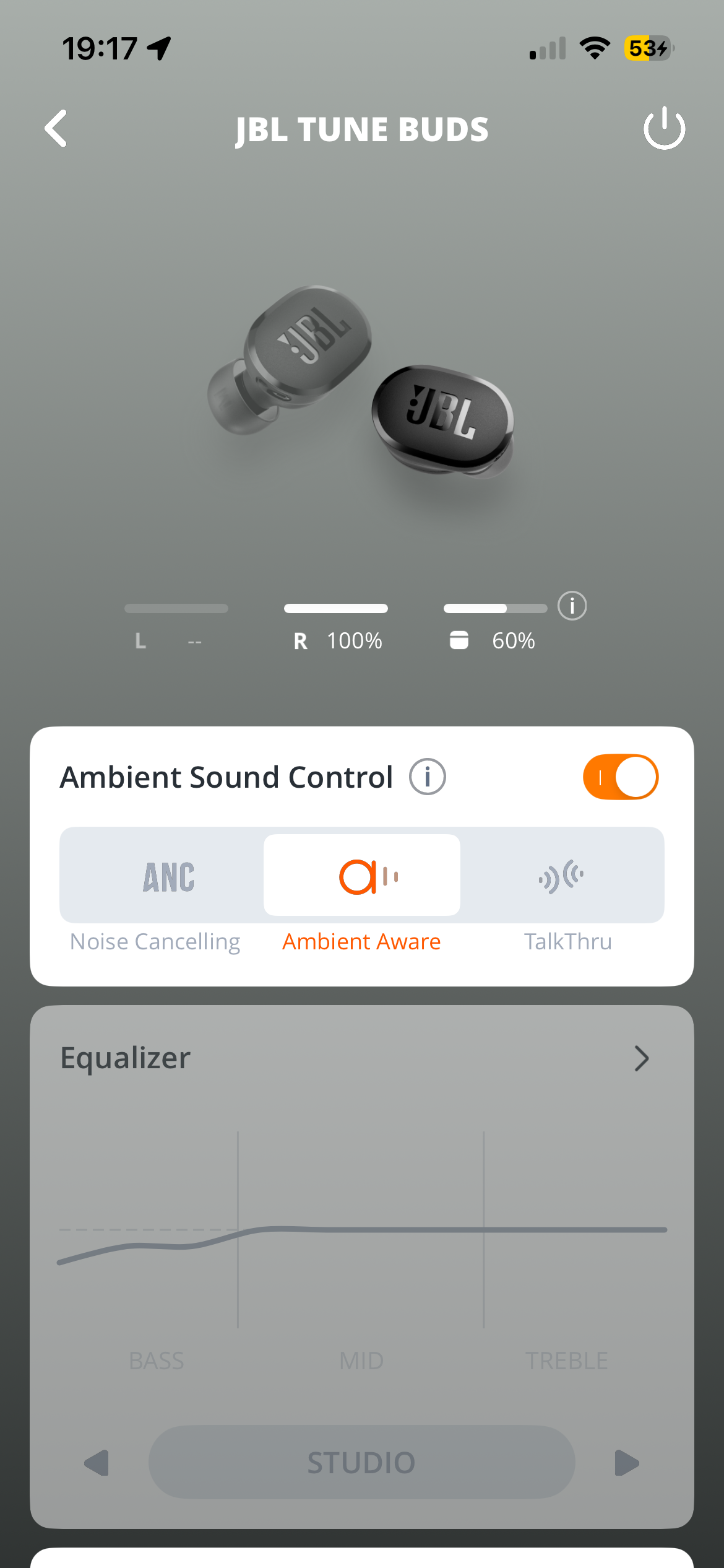  The image displays a smartphone screen with a control panel for ambient sound. The panel allows the user to adjust the volume and control the ambient sound. The screen is focused on the control panel, highlighting the main subjects and actions.