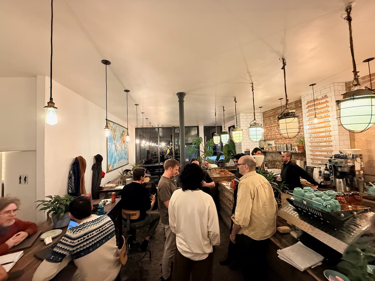 FIsheye of people gathered at a cafe.