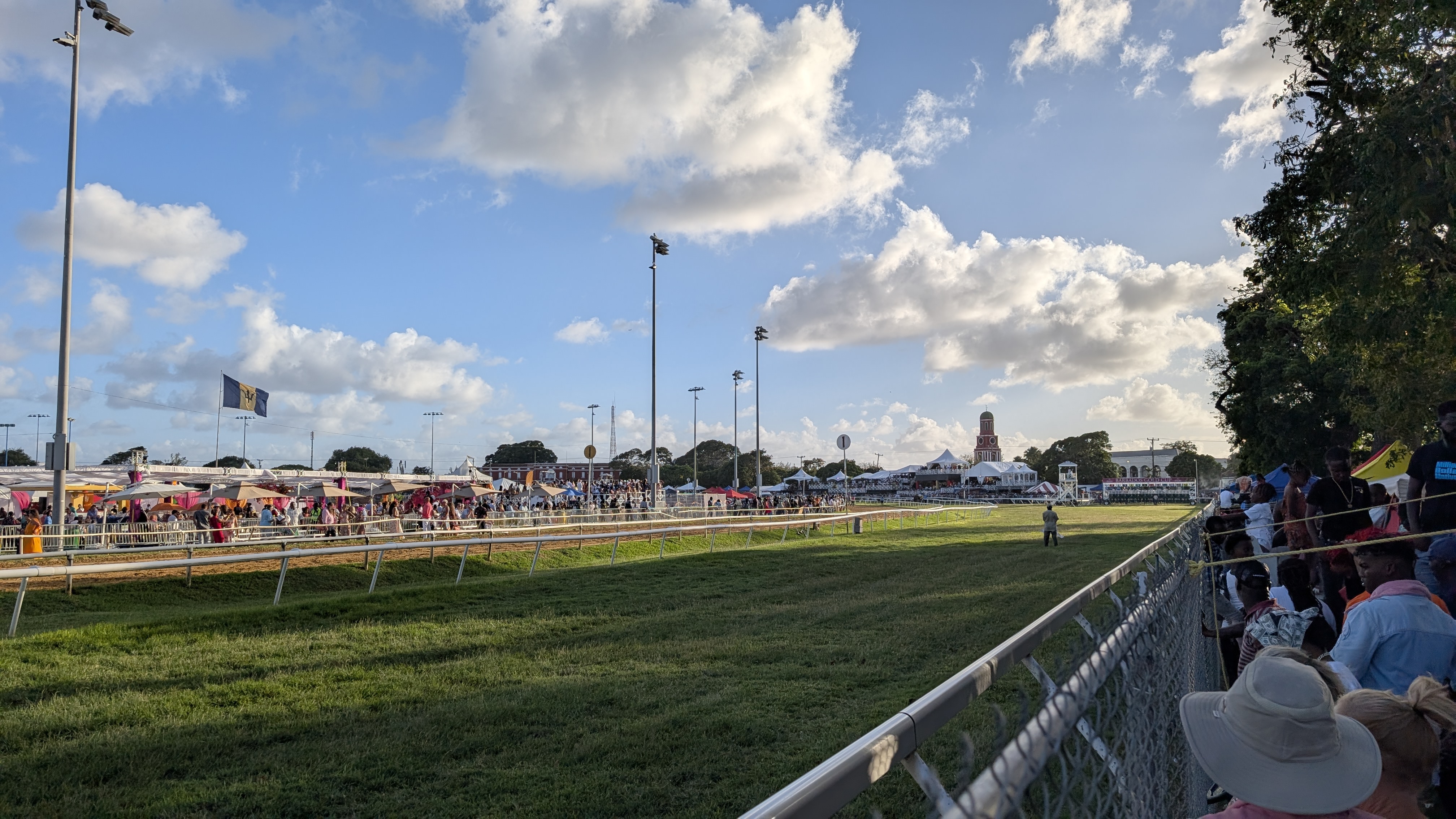 Running of the Gold Cup in Barbados, a picture of the track lined with crowds.