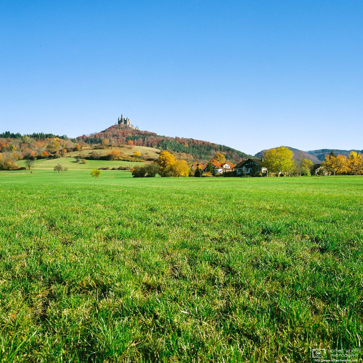 An autumnal scene around Hohenzollern Castle, the ancestral seat of the Hohenzollern family in Southwestern Germany. © 2015 Norbert Woehnl Photography.