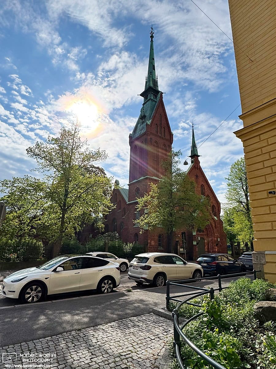 The morning sun illuminates the Church of the German Evangelical Lutheran Congregation in Helsinki, Finland. © 2026 Norbert Woehnl Photography.