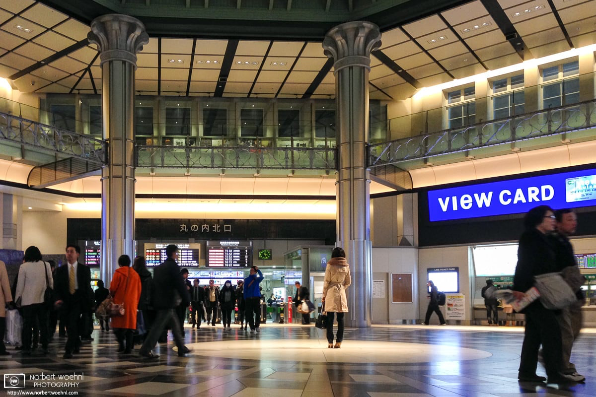 A woman is waiting underneath the northern rotunda of the old Tokyo Station building in Marunouchi, Tokyo, Japan. © 2013 Norbert Woehnl Photography.