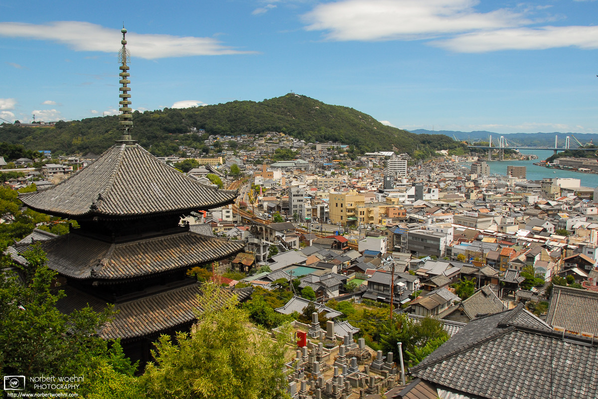 Pagoda of Tenneiji Temple and view across the city towards the Seto Inland Sea at Onomichi in Hiroshima Prefecture, Japan. © 2010 Norbert Woehnl Photography.
