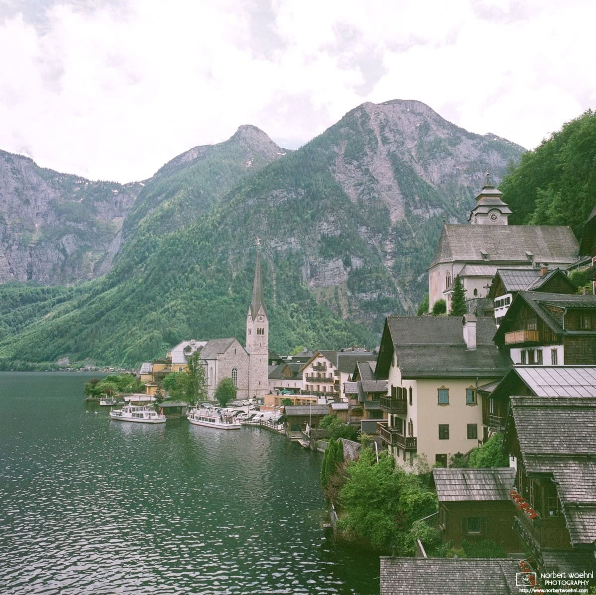A view of Hallstatt in Upper Austria, as seen from the famous vantage point (“Aussichtspunkt” in German) north of the village center. © 2024 Norbert Woehnl Photography.