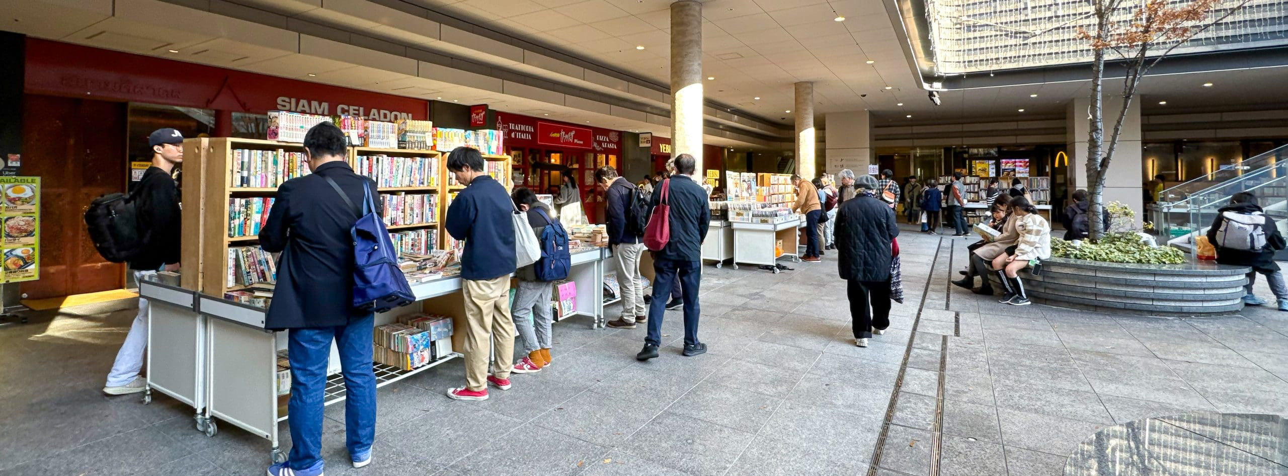 Used-books market in the basement courtyard of Sola City Ochanomizu in Tokyo, Japan. © 2025 Norbert Woehnl Photography.
