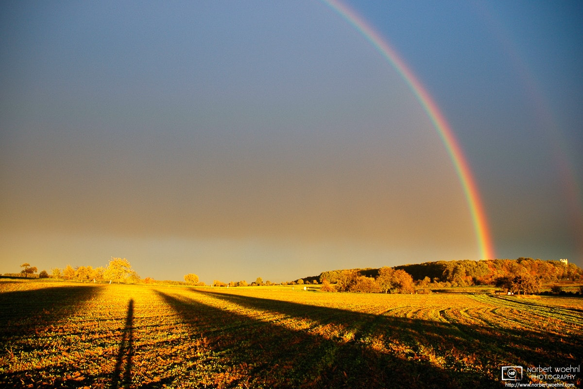 On a late autumn afternoon, a rainbow rises over the fields outside Pliezhausen in southwestern Germany. © 2004 Norbert Woehnl Photography.