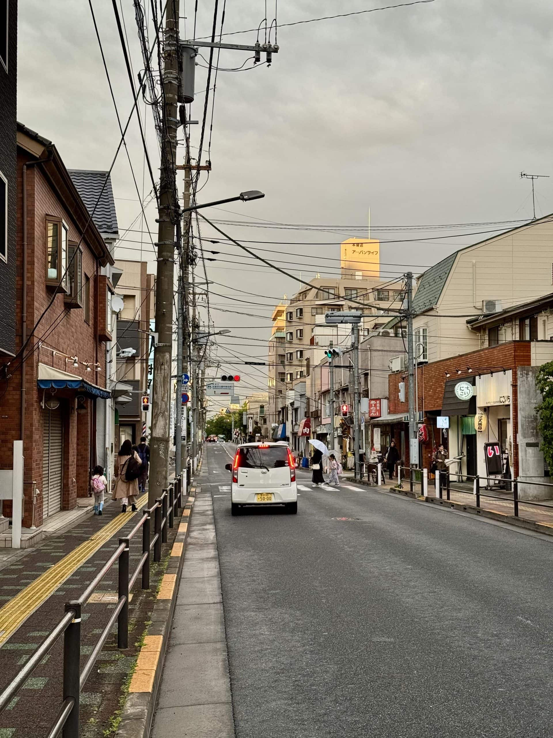 Late-afternoon sunlight hitting buildings in the Motohasunuma area of Itabashi Ward in Tokyo, Japan. © 2026 Norbert Woehnl Photography.
