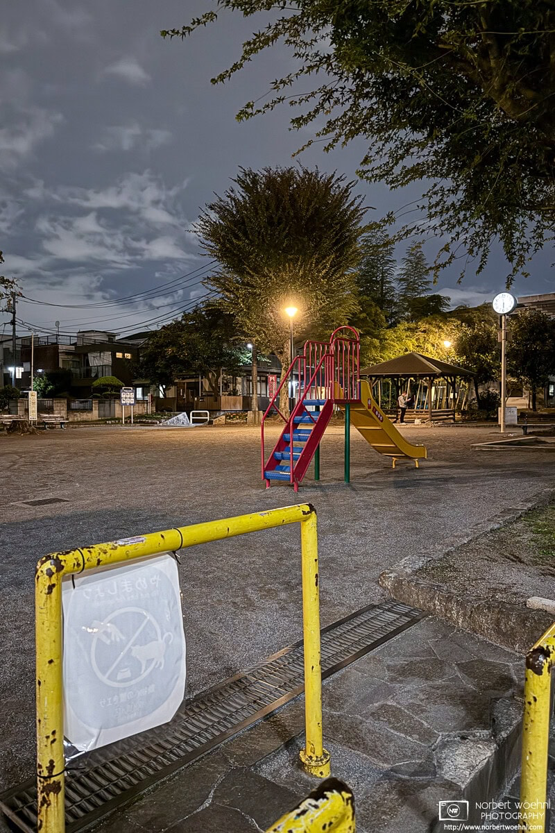 Evening scene at a playground in a residential area of Hasunumacho district in the Itabashi Ward of Tokyo, Japan. © 2025 Norbert Woehnl Photography.