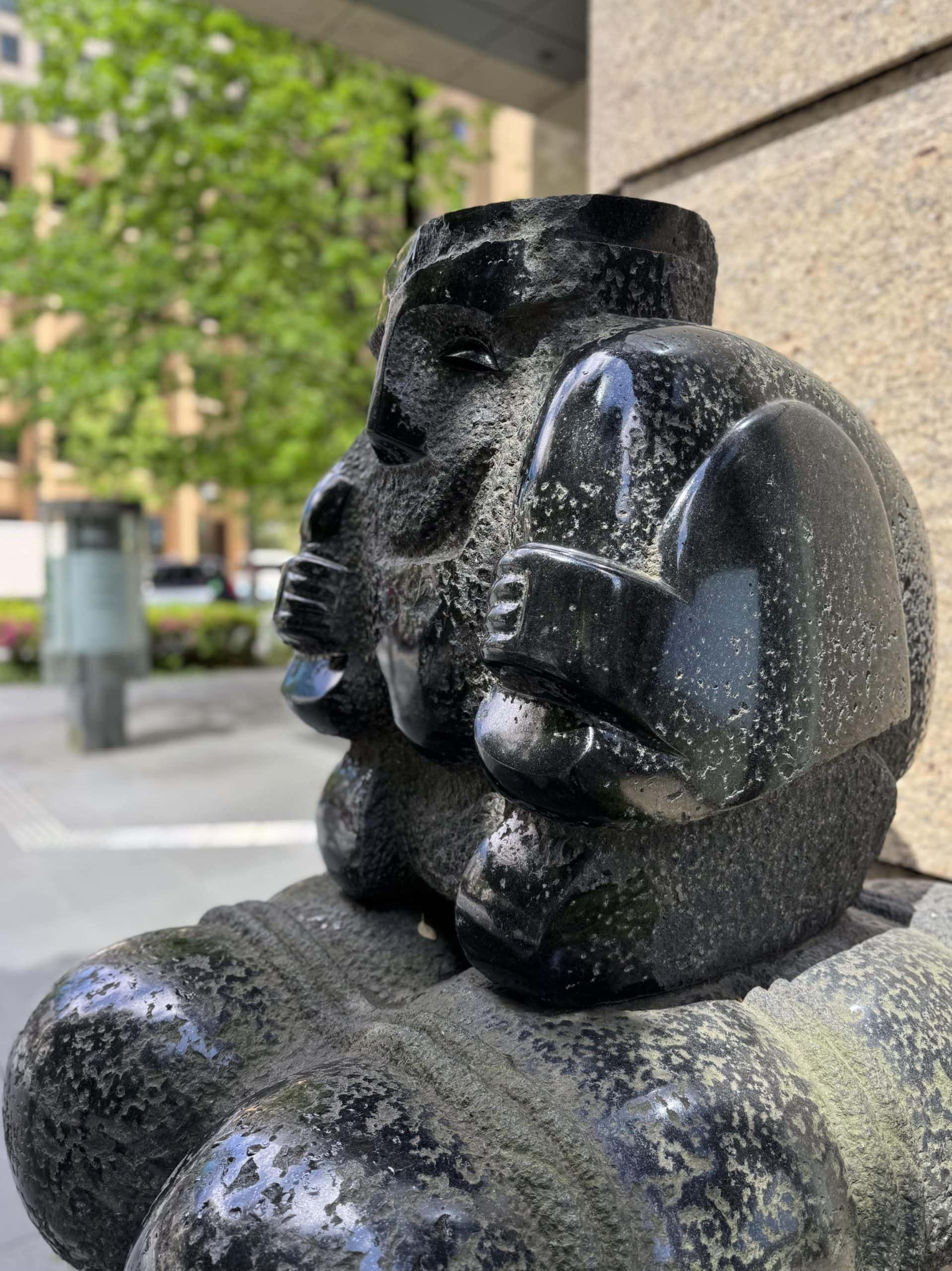 Statue outside a bank in Marunouchi, Tokyo. Quite a few passersby touch it in hopes of obtaining financial luck. © 2026 Norbert Woehnl Photography.