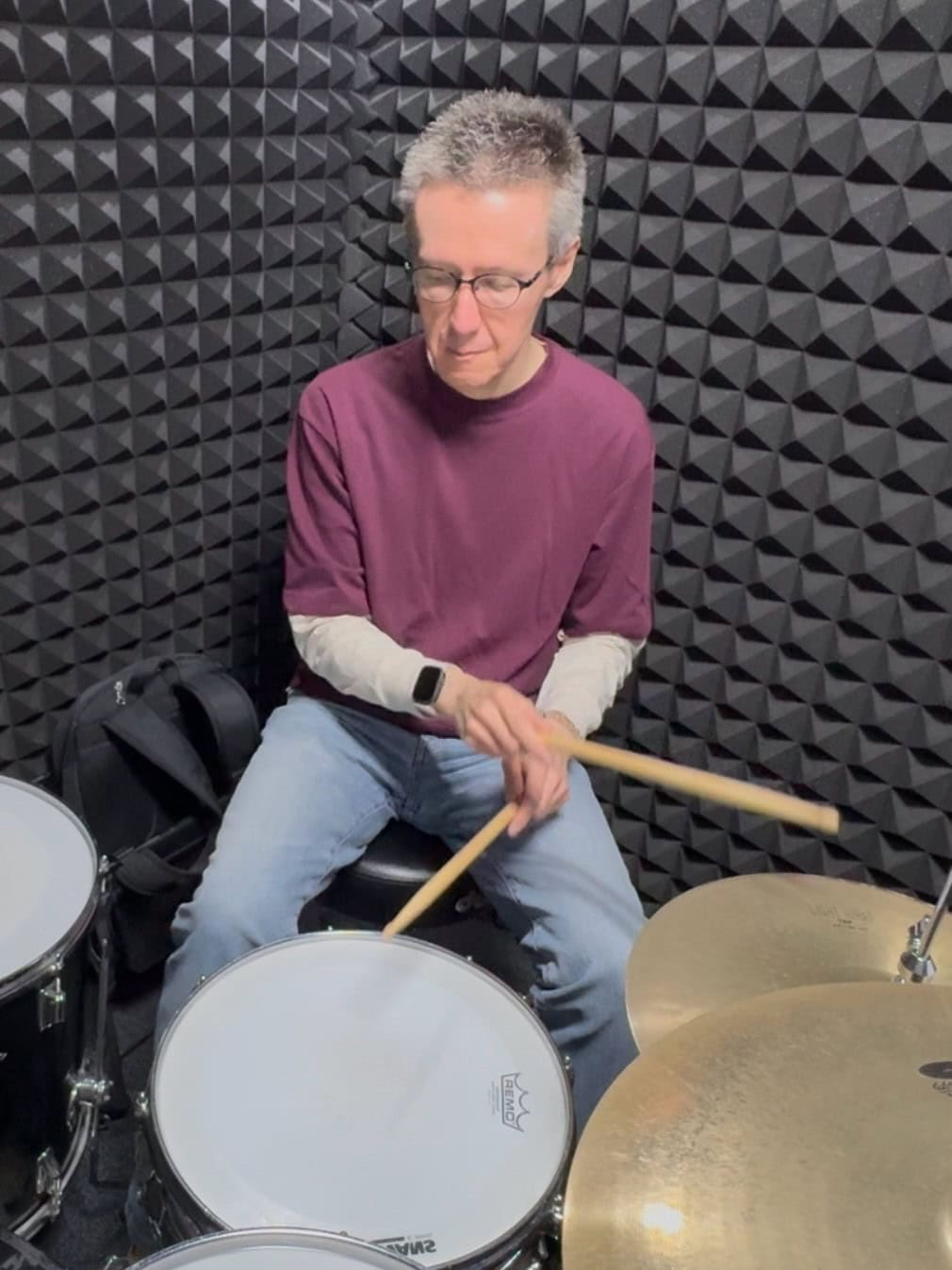 During today’s drumming lesson (still image from video).