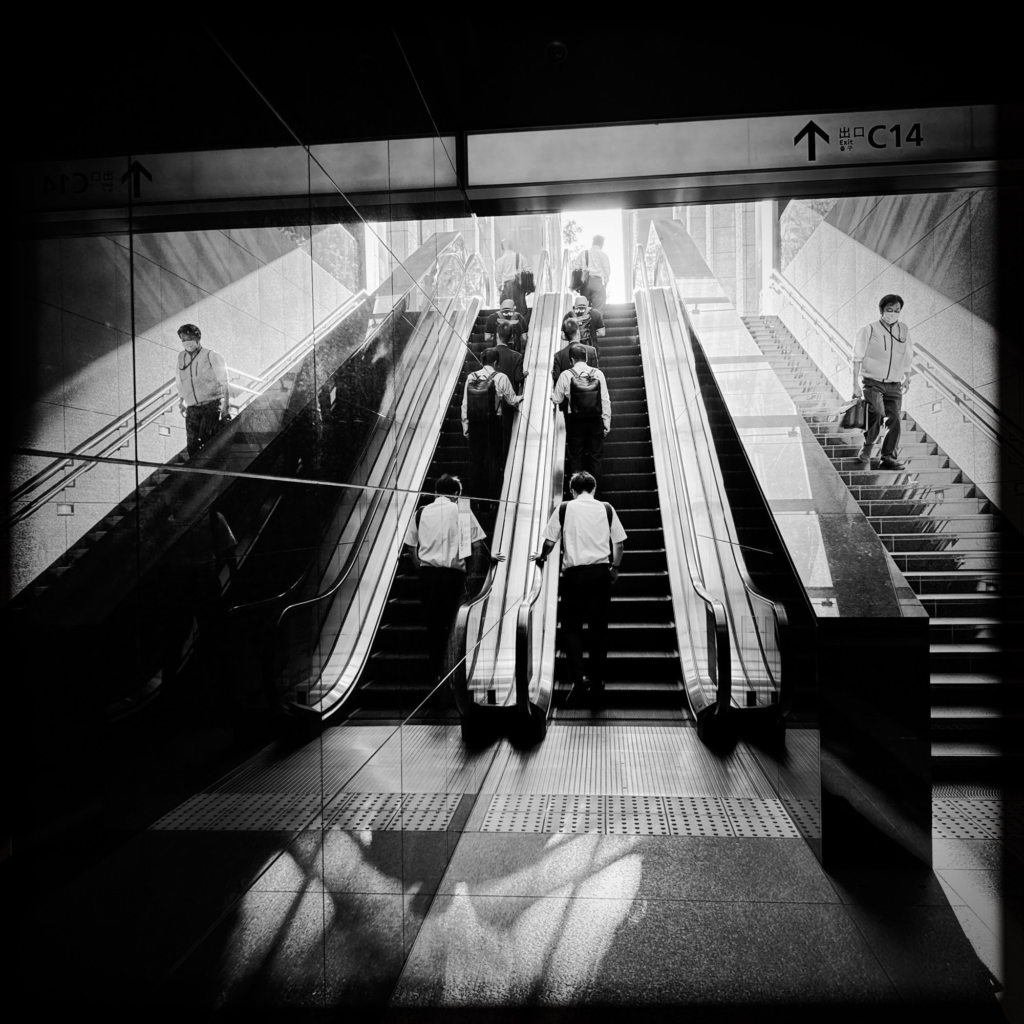 Otemachi Station in Tokyo is an intersection of five subway lines, and has many exits. This one always has some nice reflections going on. © 2025 Norbert Woehnl Photography.
