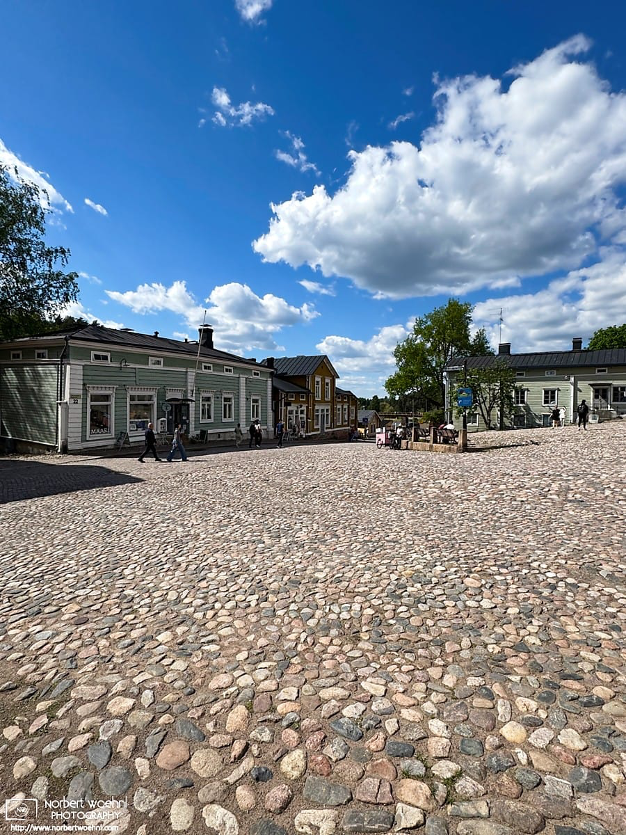 A cobblestone-paved square in the historic city center of Porvoo, Finland. © 2026 Norbert Woehnl Photography.