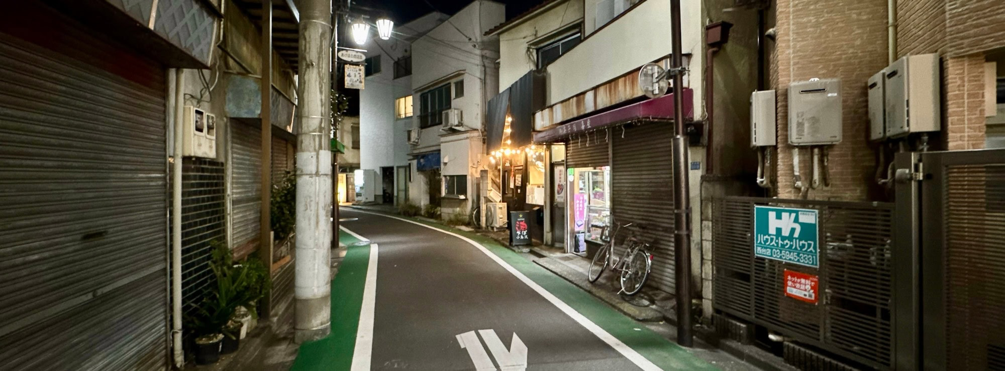 Panoramic night photo of a narrow side street in the Shimizucho area of Itabashi Ward in Tokyo, Japan. © 2026 Norbert Woehnl Photography.