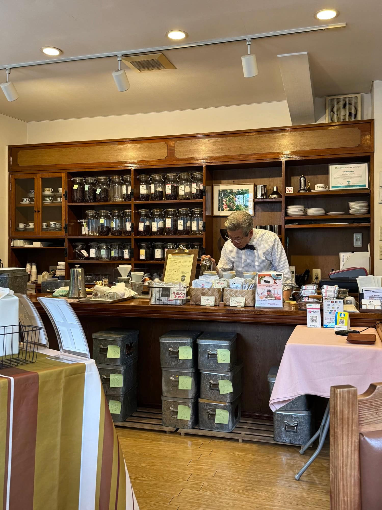 Iwasaki-san pouring a brew at Caffe Bernini in the Itabashi Ward of Tokyo, Japan. © 2025 Norbert Woehnl Photography.