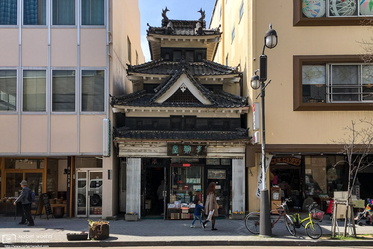 Matsumoto in Nagano Prefecture is not only home to one of Japan’s most famous castles, but also has a tiny castle-shaped bookstore. © 2016 Norbert Woehnl Photography.