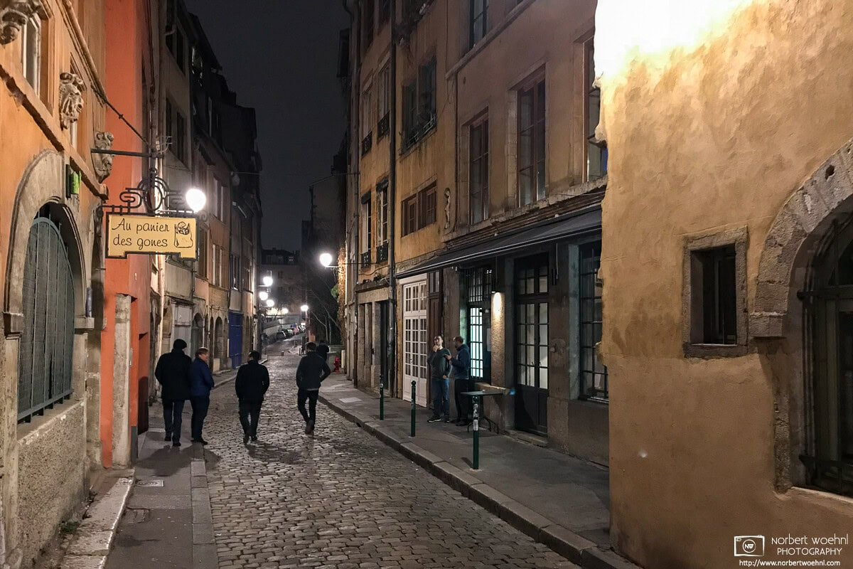 A photo taken on a winter evening walk along Rue St. Georges in Vieux Lyon, the historic city center of Lyon, France. © 2017 Norbert Woehnl Photography.