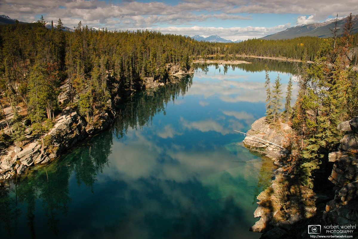 Horseshoe Lake in Jasper National Park, Alberta, Canada, gets its name from its distinctive shape. © 2005 Norbert Woehnl Photography.