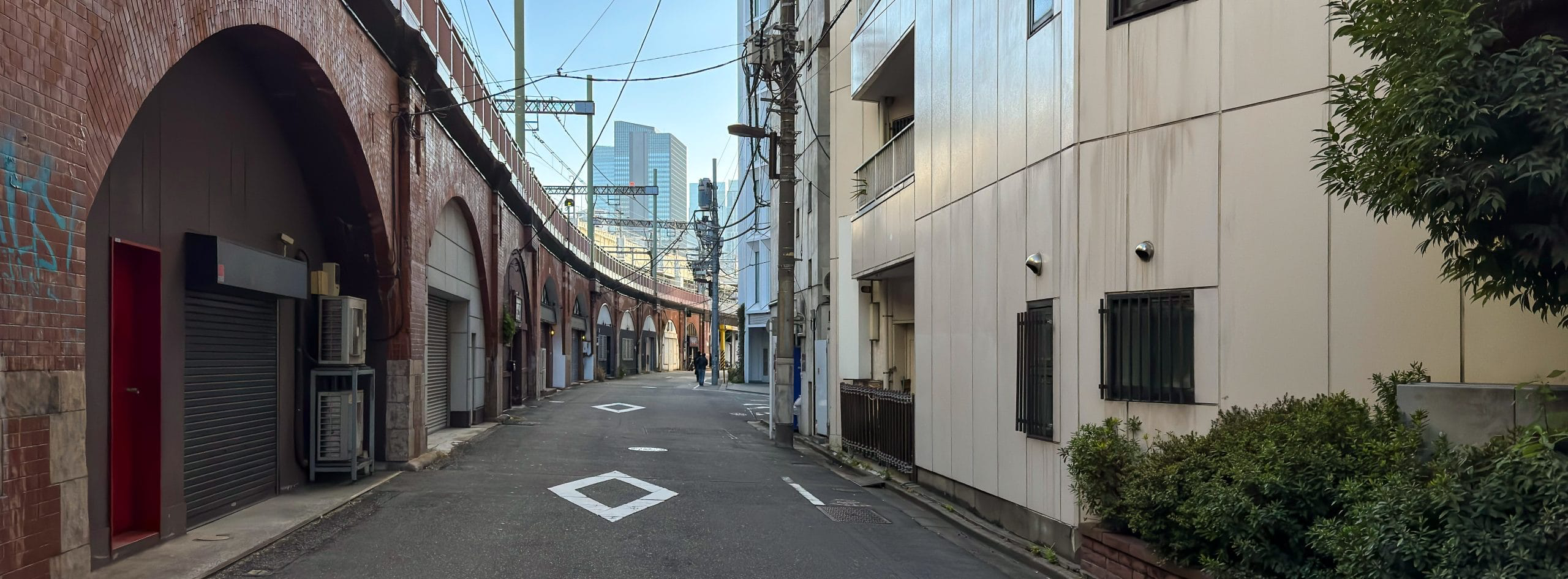 Street scene along the elevated JR tracks from the Kandakajicho area in Chiyoda Ward, Tokyo, Japan. © 2025 Norbert Woehnl Photography.