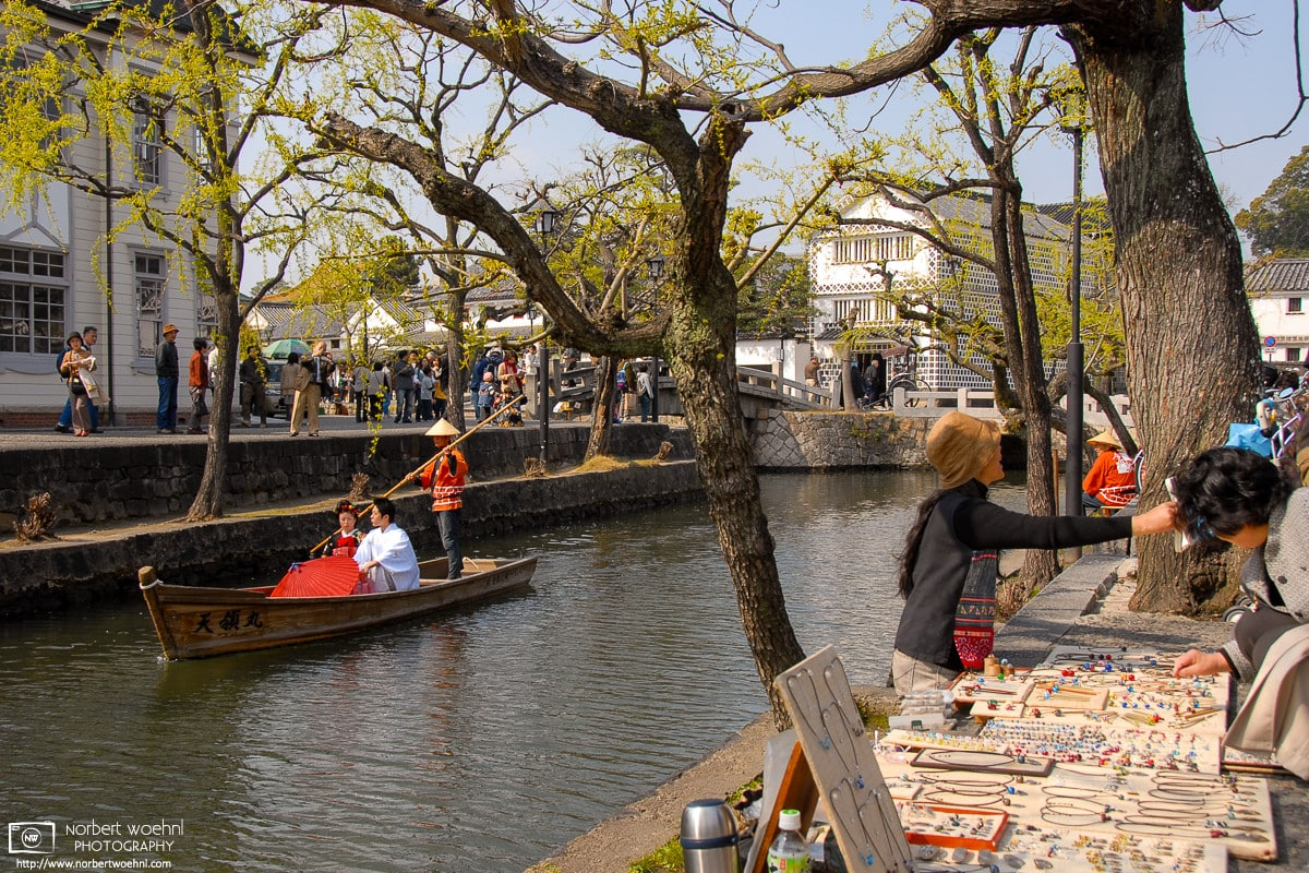 A variety of lively activities are going on along the Canal in the historic Bikan District of Kurashiki, Japan. © 2009 Norbert Woehnl Photography.