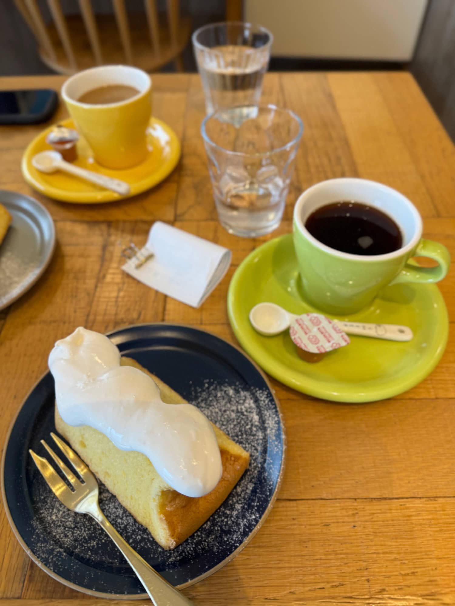 Interior photo taken at a cafe in Kita-Akabane, Tokyo, Japan - coffee and sweet potato chiffon cake. © 2025 Norbert Woehnl Photography.