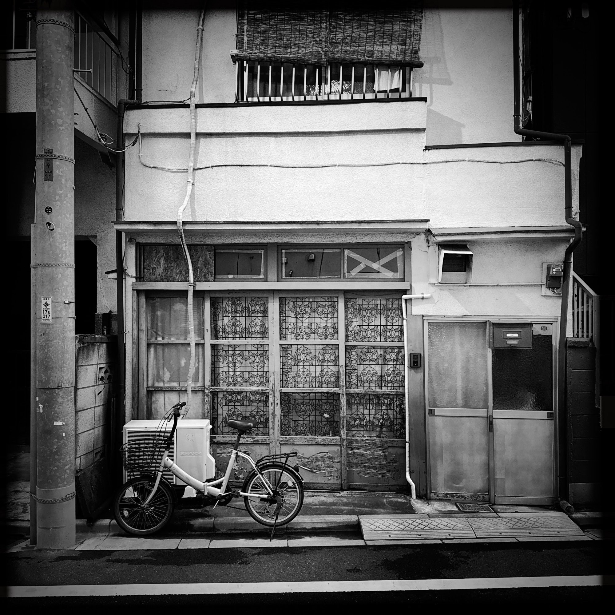 High-contrast monochrome summer evening scene from Itabashi Ward in Tokyo, Japan. © 2025 Norbert Woehnl Photography.