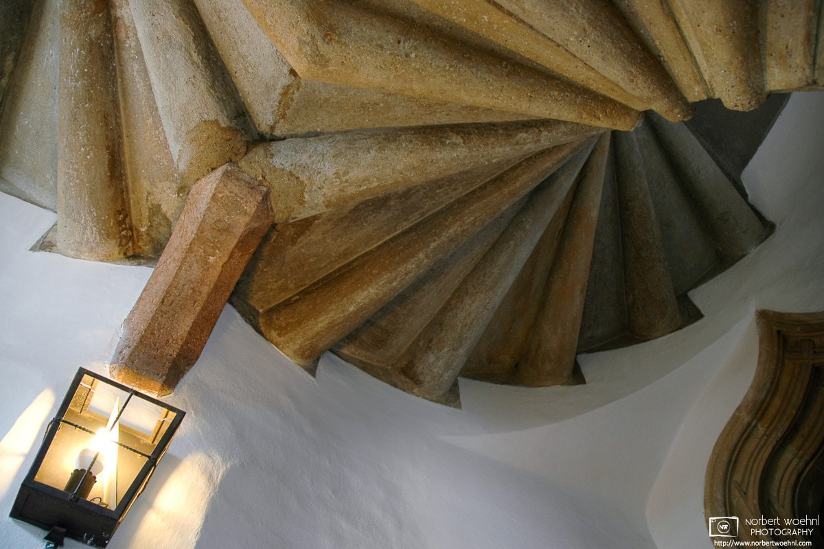 The gothic double spiral staircase in the Burg of Graz, Austria, dates back to the year 1499. © 2004 Norbert Woehnl Photography.