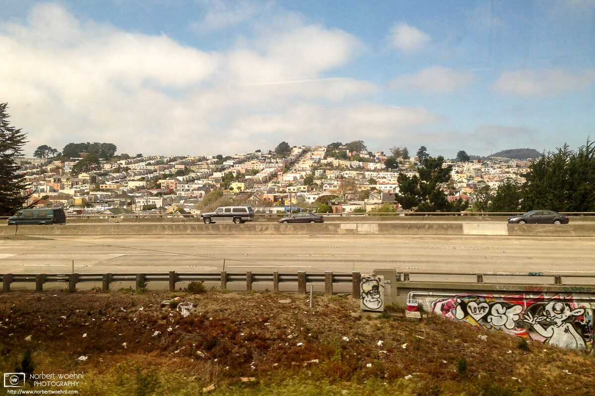 Scenery outside a BART train between downtown San Francisco and SFO Airport. This view looks across I-280 towards the Oceanview district. © 2014 Norbert Woehnl Photography.