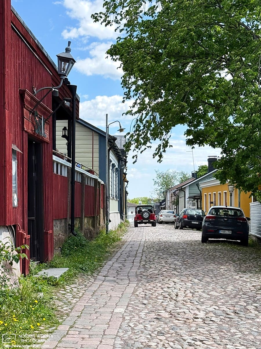 Light traffic on Vuorikatu, a street in the historic district of Porvoo, Finland. © 2026 Norbert Woehnl Photography.