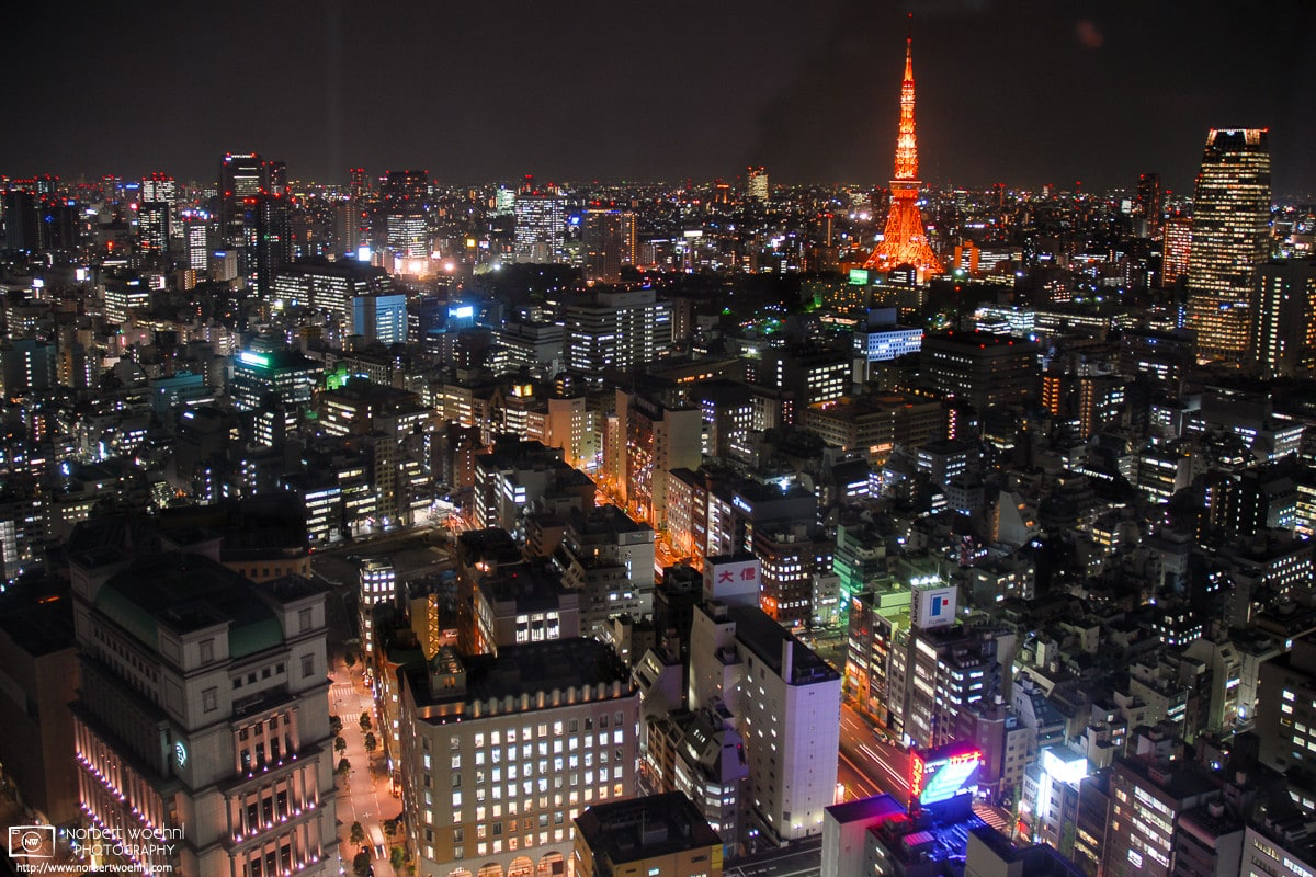 Night view towards an illuminated Tokyo Tower from a hotel room at the Park Hotel Shiodome in Tokyo, Japan. © 2006 Norbert Woehnl Photography.