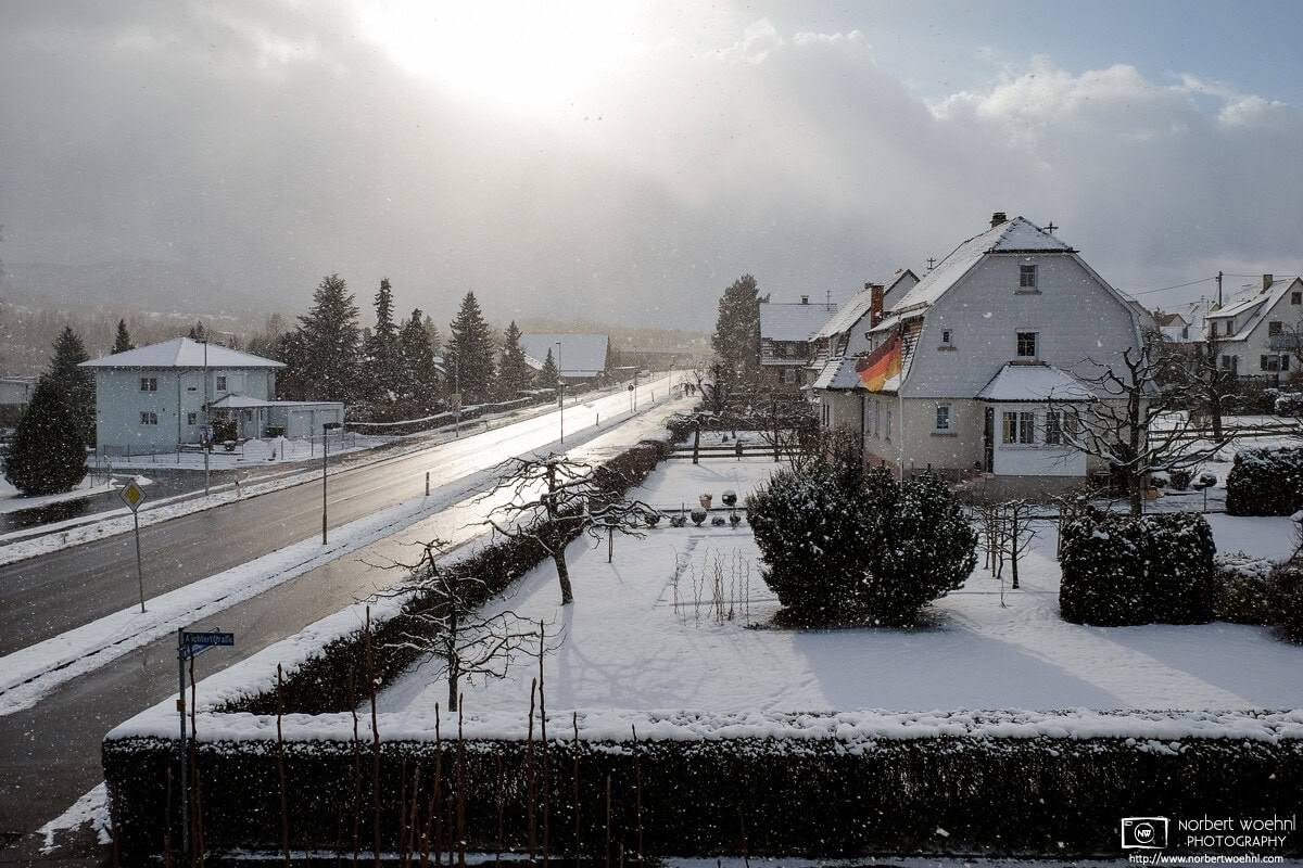A calm winter view out of the window of my study in Nehren, Germany, where I lived in the mid-2010s. There was some pretty special light during a snow shower. © 2016 Norbert Woehnl Photography.