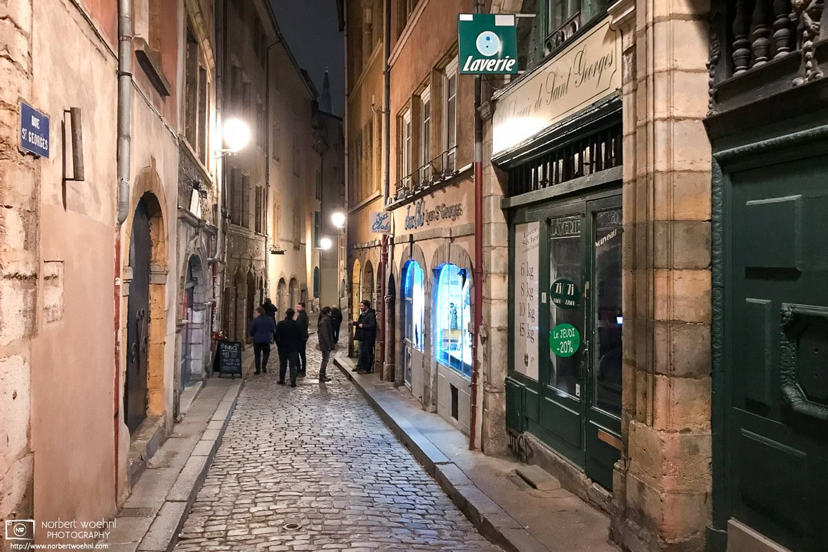 A photo taken on a winter evening walk along Rue St. Georges in Vieux Lyon, the historic city center of Lyon, France. © 2017 Norbert Woehnl Photography.