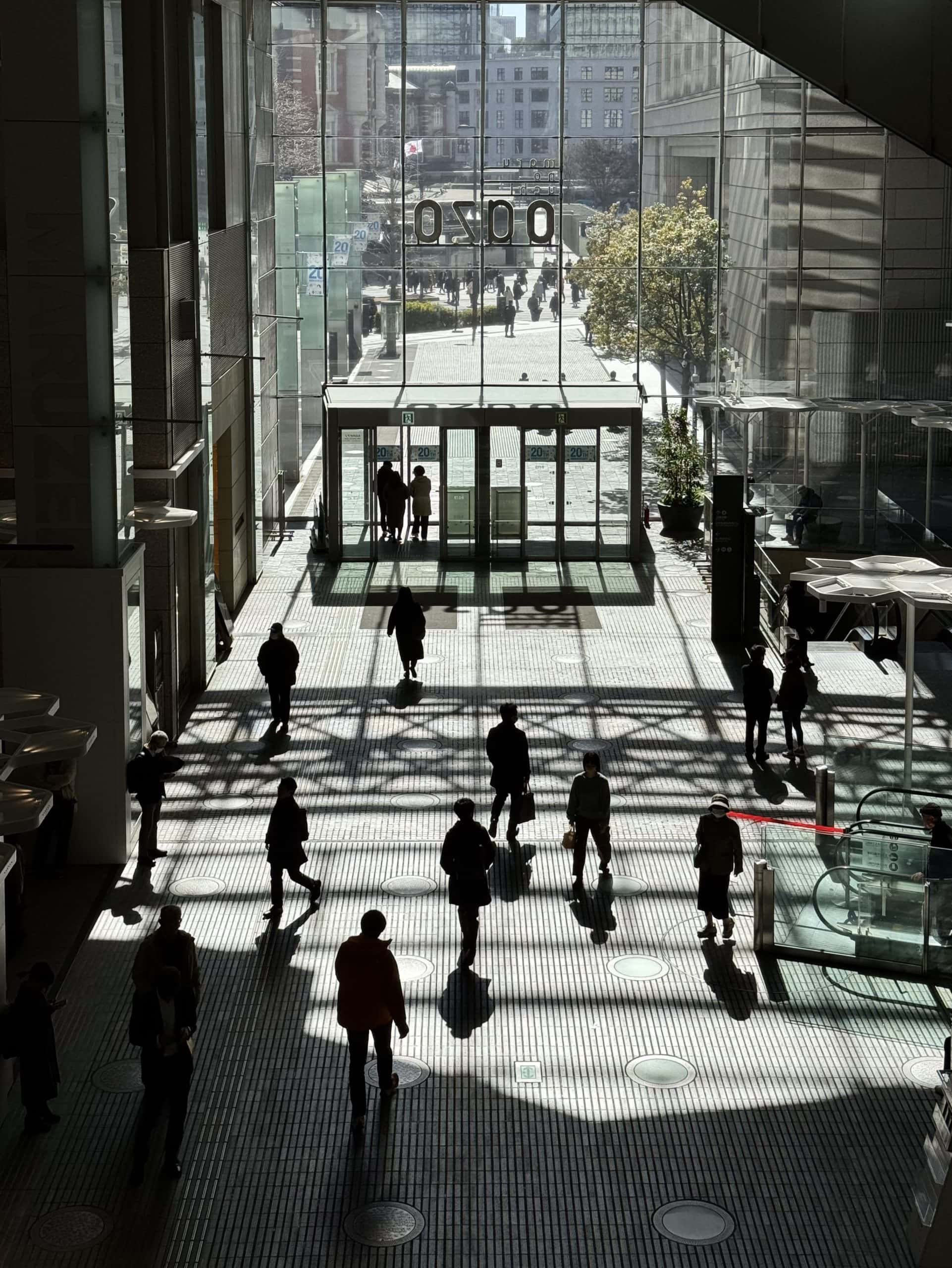 The mid-day sun is doing some artistic work on the concourse of the Marunouchi Oazo Building in Tokyo, Japan. © 2025 Norbert Woehnl Photography.