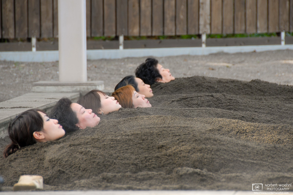 Customers are relaxing while taking a sand bath in Beppu, Oita Prefecture, Japan. © 2008 Norbert Woehnl Photography.