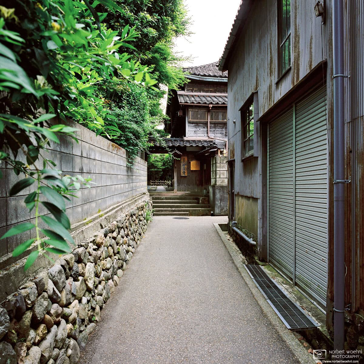 A photo taken along the approach to Myoryuji (also known as “Ninja Temple”) in Kanazawa, Japan. I was standing just outside Gannenji Temple when shooting this. © 2015 Norbert Woehnl Photography.