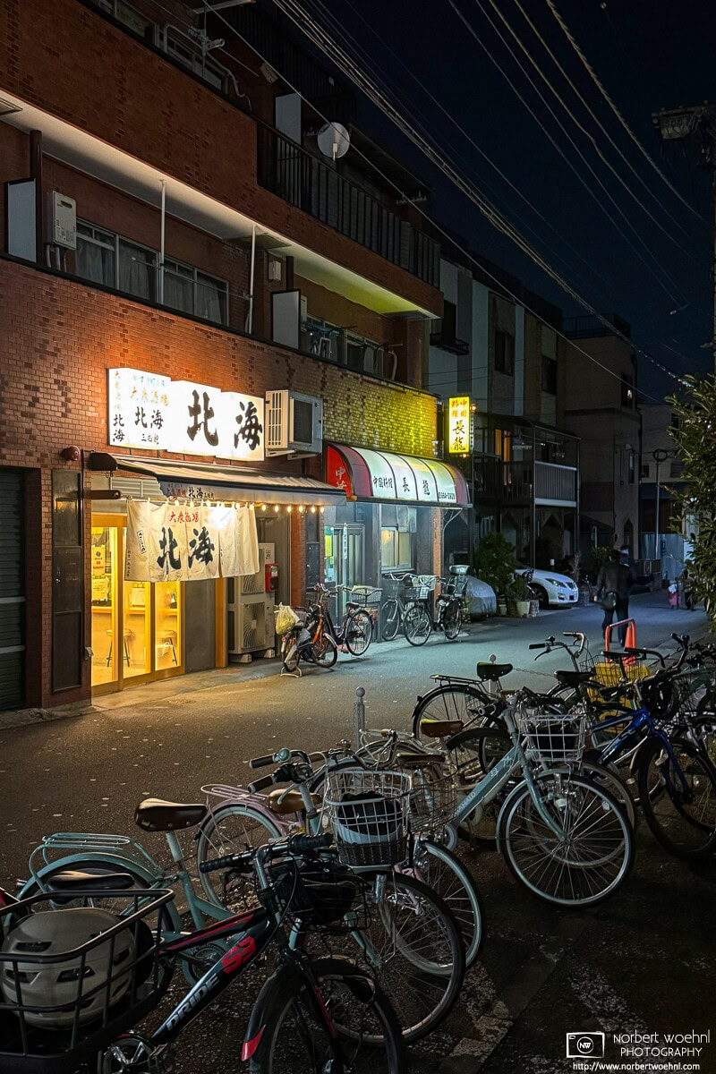 Night photograph taken in the Honcho district of Itabashi Ward in Tokyo, Japan. © 2026 Norbert Woehnl Photography.