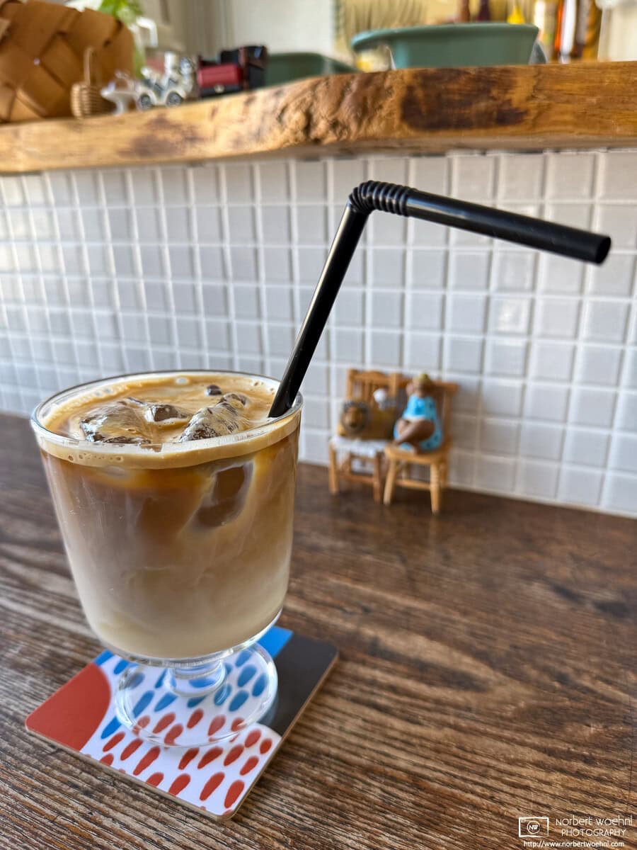 Interior decoration and iced caffe latte at Cafe Ruskä in Hakodate, Japan. © 2025 Norbert Woehnl Photography.